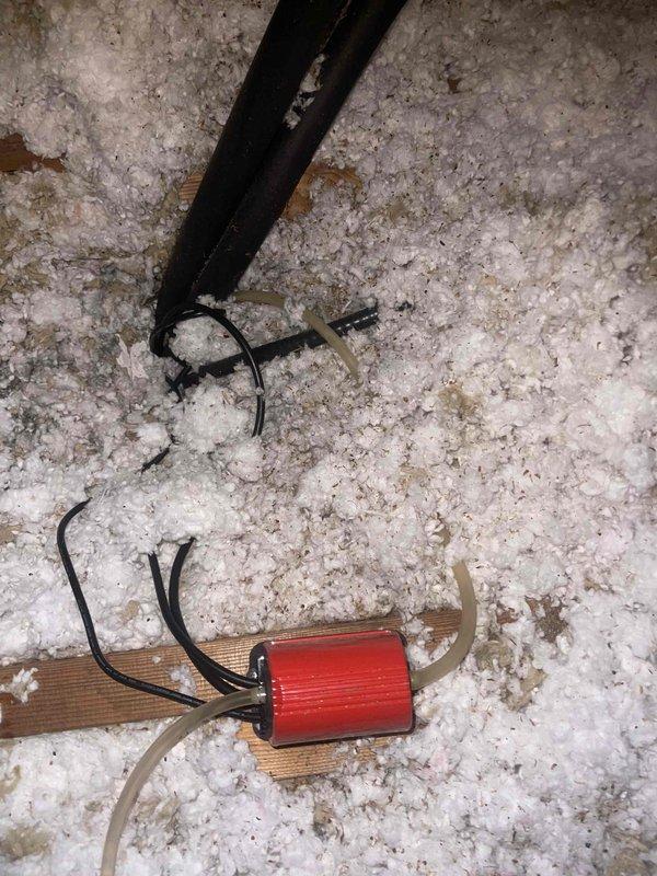 Responded to no cooling call and accessed attic-mounted air handler to diagnose system failure. Upon inspection, identified failed run capacitor as root cause of compressor not starting. Replaced defective capacitor with proper rated component, verified all electrical connections, and tested system operation. Unit now cooling properly with normal amperage draw and temperature differential across coil.