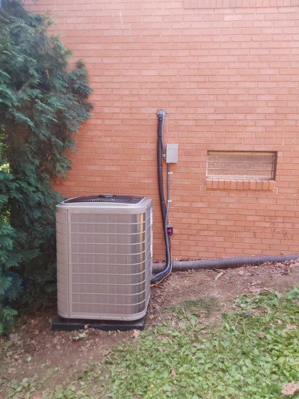 Completed full HVAC system replacement and relocation, relocating the 4.0-ton variable-speed air conditioner to the east side of the home with new mounting poles installed into the structure. Installed 987MC66100C21 Evolution gas furnace, 191VAN04800W variable-speed air conditioner utilizing R-454b refrigerant, and CVAVA3621XMA V-coil cased vertical evaporator coil. Pulled approximately 35 feet of new copper lineset to replace corroded and incorrectly sized existing lines, rerouted high voltage wiring from the electrical panel, and added ductwork to alleviate static pressure issues. Replaced filter rack with new filters, installed new condensate pump, and replaced PVC flue piping up to the second elbow. Installed Evolution thermostat, new outdoor equipment pad, and new disconnect box with fuses. Added Bryant large bypass humidifier to the system and reconnected unit to existing gas line, completing a comprehensive system upgrade that addresses equipment efficiency, refrigerant complian