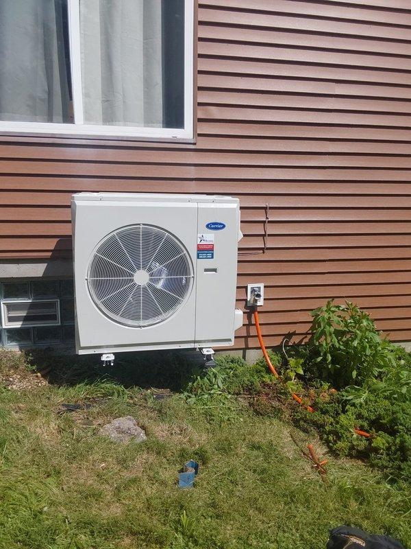 Completed full HVAC system installation including 37MUHAQ36AA3 ductless outdoor unit mounted on concrete pad with support poles, FT5ANXC36L00 R454B fan coil air handler with integrated filter rack, and TU-EC-15BKB 15kw auxiliary heat kit. Installed approximately 20 feet of refrigerant lineset, ran new high voltage electrical service to outdoor condenser with disconnect box and fuses, and built partial return air drop with return box. Added APCO-X air treatment system with UV light for enhanced indoor air quality, replaced existing thermostat with Bryant Ecobee 3 with Intelisense Lite Pro wifi-enabled unit for remote control and monitoring, and capped existing water line to water heater. System tested and operational upon completion.