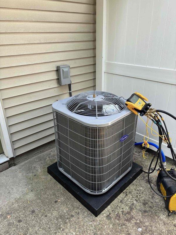 Completed commercial HVAC installation of a Bryant GA4SAN52400N 2-ton 14 SEER condenser unit with R-454B refrigerant and CVAVA2417 evaporator coil. Flushed and reused existing refrigerant lines, fabricated sheet metal connections to integrate with existing supply and return ductwork, and installed outdoor disconnect with whip, pad, and fuses. System was tested, charged to manufacturer specifications, and verified operational with all required permits obtained.