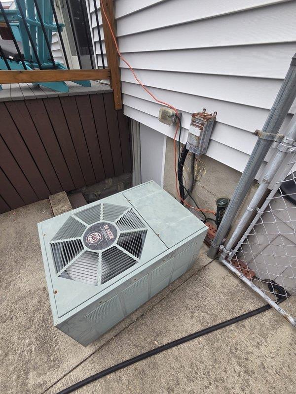 Conducted comprehensive site evaluation of existing outdoor condensing unit for system replacement estimate. Assessed current equipment configuration, including refrigerant line routing, electrical disconnect placement, and unit positioning on concrete pad. Documented installation constraints and evaluated feasibility of side-discharge configuration for replacement unit to optimize airflow and serviceability in the existing side yard location between structures.