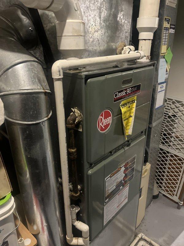 Conducted comprehensive estimate for complete HVAC system replacement at residential property. Evaluated existing Rheem Classic 90 Plus furnace and air conditioning system, documenting current equipment specifications, installation configuration, and operational status. Assessed ductwork layout, PVC condensate drainage system, electrical connections, and venting infrastructure to determine replacement requirements and compatibility considerations for new equipment installation.