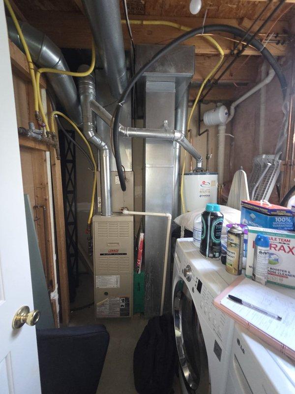 Completed estimate for replacement of non-operational gas furnace and air conditioning system. Assessed existing equipment located in basement utility area, including furnace unit with ductwork and outdoor condensing unit positioned on concrete pad against exterior wall. Provided comprehensive replacement options and recommendations for new HVAC system installation.