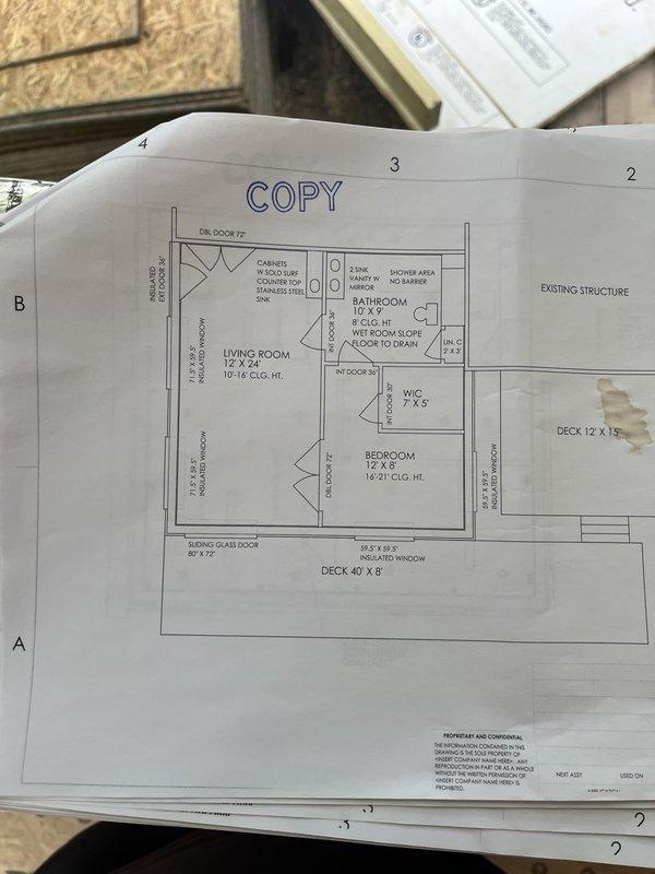 Conducted on-site assessment for air conditioning and gas furnace replacement in residential property currently under construction. Evaluated existing framing structure, reviewed architectural floor plans showing living spaces with varying ceiling heights, and documented installation requirements. Photographed construction site conditions including window openings, electrical routing, and spatial layout to determine optimal equipment placement and ductwork configuration for the new HVAC system.