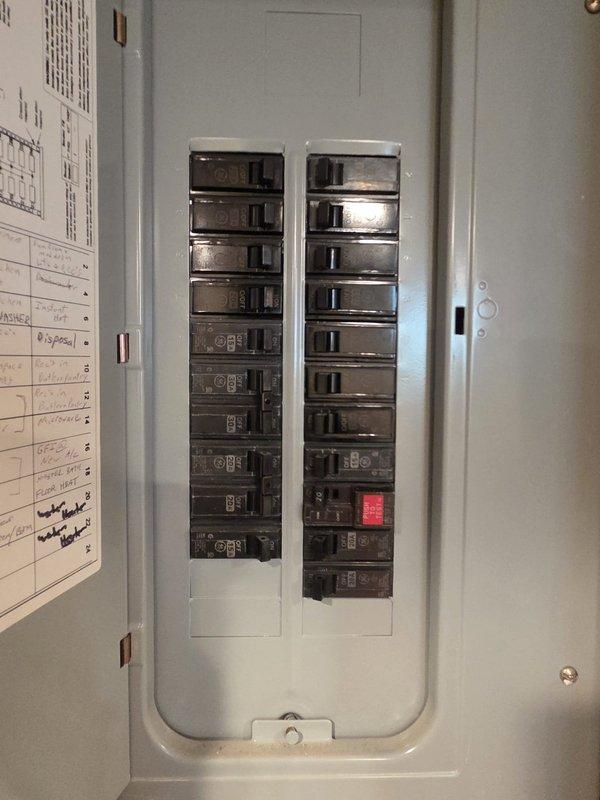 Conducted on-site assessment for mini-split installation in second-floor master bedroom. Evaluated existing electrical panel capacity and identified available circuit breaker positions for new dedicated line. Inspected exterior building facade to determine optimal condenser placement and line set routing from ground level to second-floor bedroom location. Documented electrical infrastructure and exterior mounting options to prepare comprehensive installation estimate.