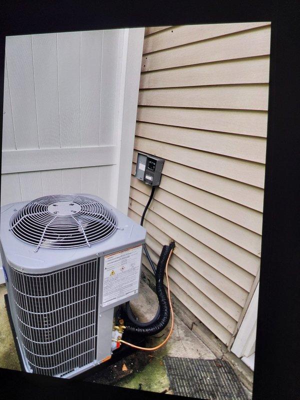 Completed full HVAC system replacement at commercial apartment facility, installing Bryant GA4SAN52400N 2-ton 14 SEER condenser with R-454B refrigerant, Bryant 912SE36040 90% gas furnace, and CVAVA2414 evaporator coil. Flushed and reused existing refrigerant lines, fabricated sheet metal connections to integrate with existing ductwork supply and return plenums, and installed outdoor disconnect with whip, pad, and fuses. System commissioned with electrical draw verified at 6.15 amps, all equipment tested and operational, permit obtained and inspection completed.