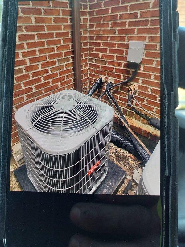 Completed commercial HVAC installation including a Bryant GA4SAN518 5-ton condenser unit with R454B refrigerant and 24RAQ-3 evaporator coil. Installed electrical disconnect box, whip assembly with Littelfuse cartridge fuses, refrigerant line set with foam insulation, and conduit routing along exterior brick wall. Fabricated and installed sheet metal transitions to connect new equipment to existing supply and return ductwork, mounted condenser on concrete pad, and disposed of all removed equipment in accordance with EPA refrigerant recovery regulations.