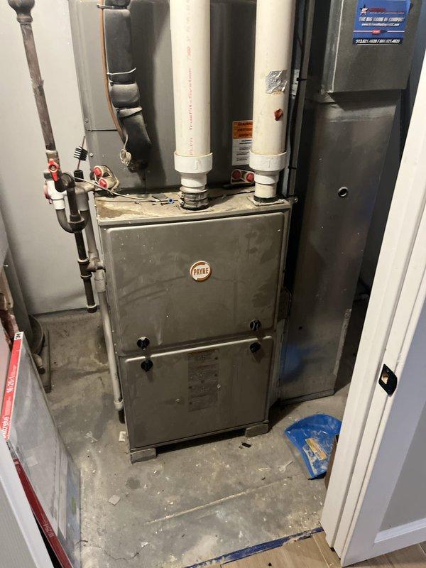 Conducted site assessment of third-floor mechanical room to provide air conditioning replacement options for existing HVAC system. Evaluated current Payne furnace installation, existing ductwork configuration, and available space for new cooling equipment. Documented equipment specifications, refrigerant line routing, and condensate drainage system to determine optimal AC unit sizing and installation requirements for the space.