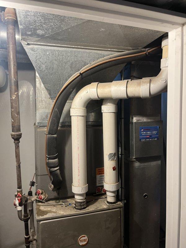 Conducted site assessment of third-floor mechanical room to provide air conditioning replacement options for existing HVAC system. Evaluated current Payne furnace installation, existing ductwork configuration, and available space for new cooling equipment. Documented equipment specifications, refrigerant line routing, and condensate drainage system to determine optimal AC unit sizing and installation requirements for the space.
