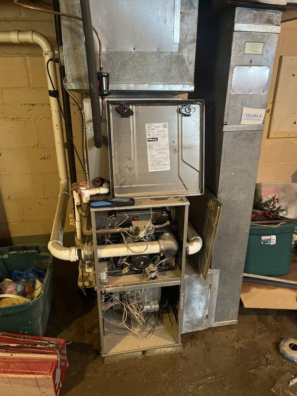 Provided comprehensive estimate for complete HVAC system replacement following flood damage to existing equipment. Assessment included outdoor condensing unit and indoor gas furnace with air handler, both requiring replacement due to water intrusion. Documented current system configuration, refrigerant line routing, electrical connections, and ductwork layout to ensure proper specifications for replacement equipment sizing and installation requirements.