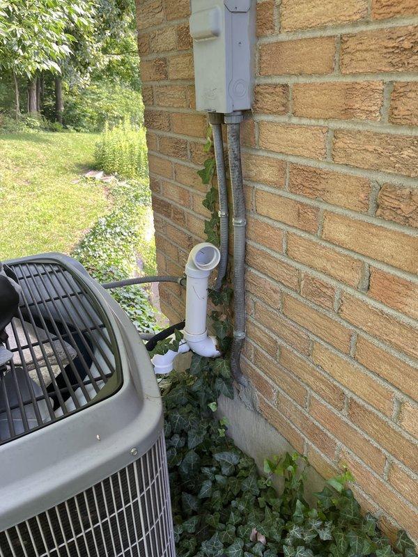Conducted comprehensive assessment of existing HVAC system for replacement estimate. Evaluated indoor air handler unit located in utility closet with vertical ductwork configuration and existing refrigerant lines, as well as outdoor condenser unit positioned at building exterior. Documented current system components, installation conditions, and spatial constraints to provide accurate replacement recommendations.