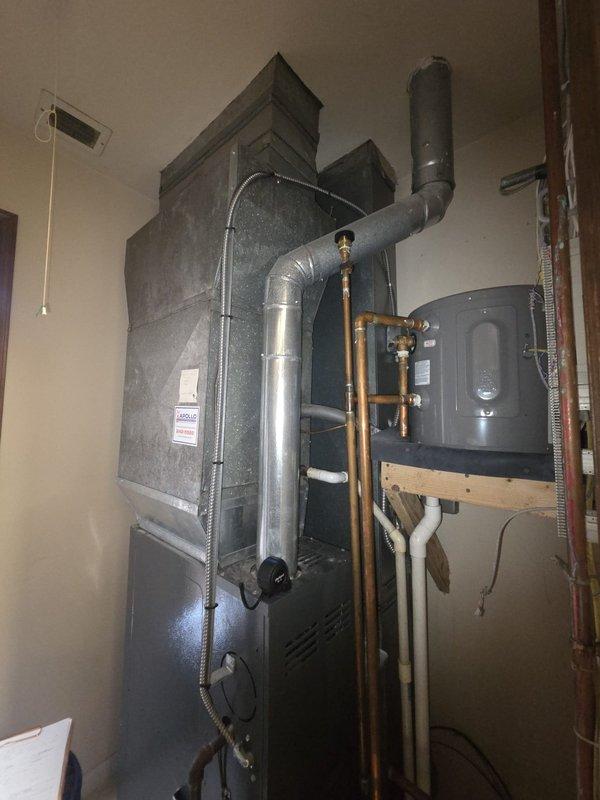 Completed comprehensive evaluation of existing R-22 split system experiencing refrigerant leak and loss of cooling capacity. Assessed indoor furnace unit and associated mechanical components in utility room, documenting equipment age, condition, and configuration. Provided detailed estimate for complete system replacement to address refrigerant leak and restore cooling functionality with updated equipment compliant with current refrigerant regulations.