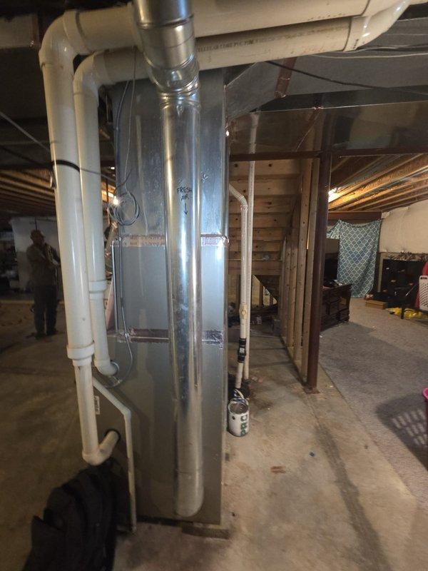 Completed estimate for complete HVAC system replacement in residential basement installation. Evaluated existing air handler unit with metallic ductwork and PVC condensate drainage system, and assessed current Bryant Evolution System programmable thermostat for compatibility with proposed replacement equipment.