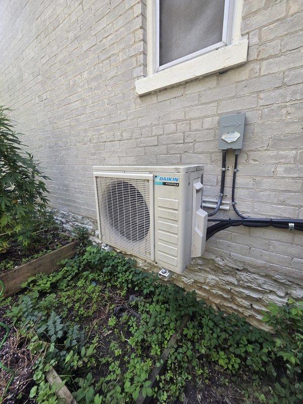 Performed estimate on existing Daikin mini split system requiring multiple component replacements including EEV, control board, and fan motor. Evaluated system condition to determine cost-effectiveness of repair versus full system replacement, documented equipment location and current installation setup with photos of both indoor and outdoor units.