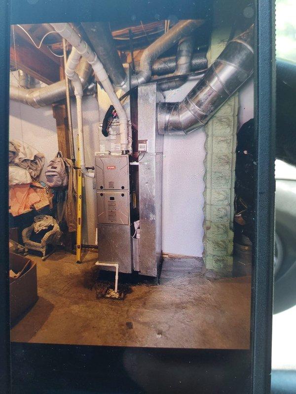 Completed full HVAC system installation in basement utility area consisting of 2.0-ton 146SAN02400W single-stage air conditioner utilizing R454B refrigerant, 916SA48060M17 97% AFUE single-stage gas furnace with constant torque ECM motor, and CVAVA2417XMA cased vertical V-coil evaporator. Installed and connected all ductwork, gas piping, electrical connections, and refrigerant lines per manufacturer specifications. Performed system startup, verified proper airflow and temperature differentials across evaporator coil, confirmed gas furnace combustion efficiency, and tested air conditioning performance with digital diagnostic equipment showing appropriate superheat and subcooling values. System operational and performing within normal parameters.