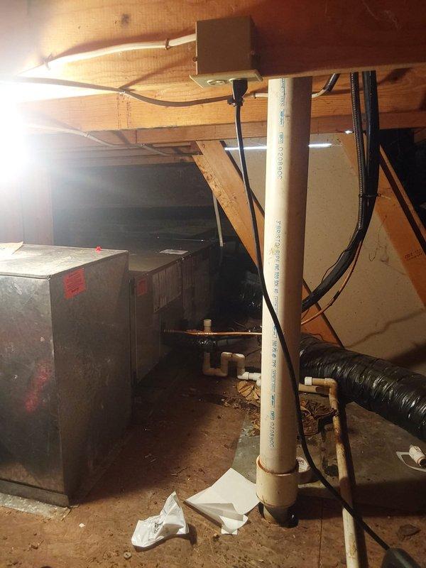 Completed full commercial HVAC system installation including Bryant GA4SAN518 1.5 ton air conditioning condenser unit positioned on rooftop and Bryant FJ5ANXA18 air handler with 10 kW electric heat strip installed in basement crawl space. Installed new thermostat, fabricated and connected sheet metal transition to existing flue system, and ran refrigerant lines with proper insulation between indoor and outdoor units. Installed electrical disconnect, whip, condenser pad, and appropriate fuses for both units, secured all wiring and refrigerant lines to floor joists using proper fastening methods, and evacuated and charged system to manufacturer specifications. Removed and properly disposed of existing HVAC equipment in accordance with EPA regulations, obtained necessary permit, and completed all required inspections. System tested and verified operational with all safety controls functioning properly.