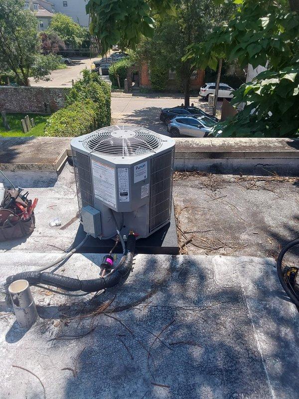 Completed full commercial HVAC system installation including Bryant GA4SAN518 1.5 ton air conditioning condenser unit positioned on rooftop and Bryant FJ5ANXA18 air handler with 10 kW electric heat strip installed in basement crawl space. Installed new thermostat, fabricated and connected sheet metal transition to existing flue system, and ran refrigerant lines with proper insulation between indoor and outdoor units. Installed electrical disconnect, whip, condenser pad, and appropriate fuses for both units, secured all wiring and refrigerant lines to floor joists using proper fastening methods, and evacuated and charged system to manufacturer specifications. Removed and properly disposed of existing HVAC equipment in accordance with EPA regulations, obtained necessary permit, and completed all required inspections. System tested and verified operational with all safety controls functioning properly.