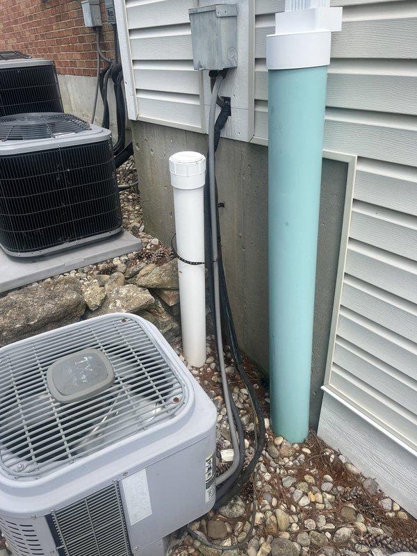 Conducted comprehensive assessment of existing residential HVAC system for replacement estimate. Evaluated outdoor condensing units positioned along building foundation and indoor air handler unit installed in utility closet. Documented current equipment configuration, including ductwork connections, condensate drain lines, electrical service, and refrigerant line sets. Photographed existing system components to provide detailed replacement specifications and equipment sizing recommendations.