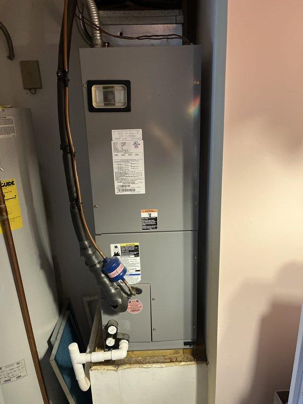Conducted comprehensive assessment of existing residential HVAC system for replacement estimate. Evaluated outdoor condensing units positioned along building foundation and indoor air handler unit installed in utility closet. Documented current equipment configuration, including ductwork connections, condensate drain lines, electrical service, and refrigerant line sets. Photographed existing system components to provide detailed replacement specifications and equipment sizing recommendations.