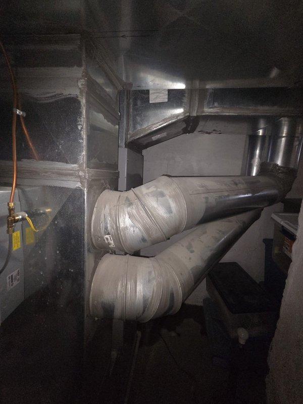 Conducted estimate for replacement of 13-year-old gas furnace and air conditioning system currently operating without issues. Inspected existing HVAC equipment in attic installation, including air handler unit, flexible and rigid ductwork, gas line connections, electrical components, and PVC condensate drain. Documented system configuration and provided replacement options to customer.