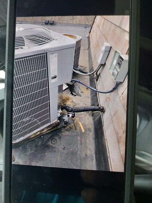 Completed commercial rooftop HVAC installation featuring dual 3-ton condensing units for multi-zone cooling application. Installed customer-supplied Bryant GA5SAN43600 3-ton 14 SEER condenser with R410A refrigerant paired with Bryant CVAVA3617 evaporator coil, and added Bryant GA4SAN53600 3-ton condensing unit with R454B refrigerant to expand system capacity. Flushed existing refrigerant lines to ensure compatibility and reused existing line sets to minimize installation impact. Installed outdoor electrical disconnect with whip for proper service access and electrical code compliance. Removed and disposed of existing HVAC equipment following EPA regulations for proper refrigerant recovery and environmental compliance. Verified all electrical connections, refrigerant line integrity, and mounted equipment securely on rooftop pad. System tested and operational upon completion.