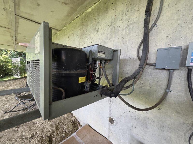 Conducted comprehensive estimate for complete HVAC system replacement including air conditioning unit and furnace. Performed detailed load calculations revealing cooling load of 28,202 BTU and heating load of 30,504 BTU, with analysis of glass exposure diversity showing peak demand occurring between 2pm-4pm. Inspected existing outdoor condenser unit, electrical disconnect, and associated wiring infrastructure to assess current system configuration and determine replacement requirements.