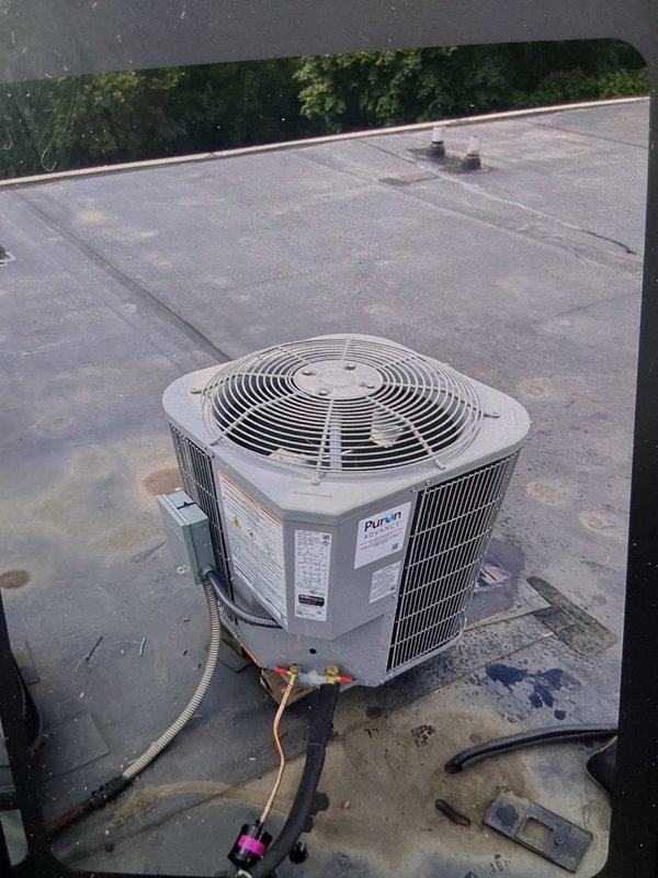 Completed full commercial HVAC system installation including ADP BCRMA2124S3N3 rooftop condenser unit and Bryant GA4SAN518 gas furnace. Installed electrical disconnect, whip, and fuses, ran refrigerant lines and flexible conduit from rooftop unit to interior mechanical closet, and verified all connections for proper system operation.