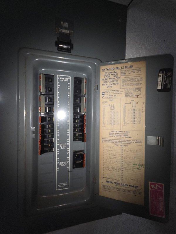 Conducted on-site estimate for complete heat pump and air handler replacement system. Performed thorough assessment of existing HVAC equipment, documenting current system conditions including aged capacitor showing wear and discoloration, contactor assembly with multiple wire connections, and overall component deterioration indicating need for replacement. Evaluated existing electrical infrastructure, noting Federal Pacific Electric panel with multiple circuit breakers and main disconnect switch. Photographed equipment components and electrical systems to support replacement recommendations. Customer requested email communication for estimate delivery and provided contact information for follow-up.