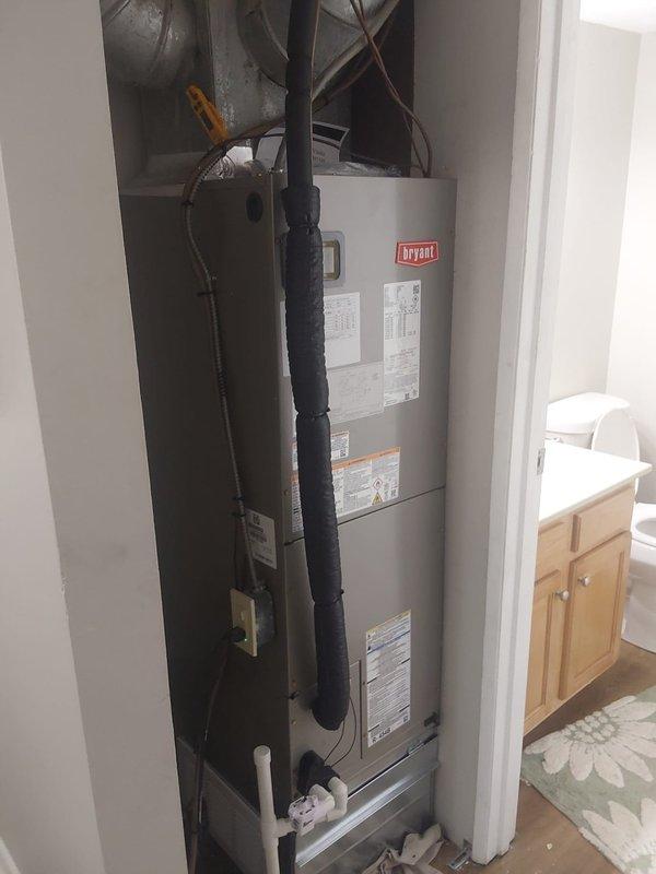 Completed full HVAC system replacement at multi-unit residential property, installing Bryant FJ5ANXB24L00 air handler with 8kW electric heat pack in interior closet space and Bryant GA4SAN52400N 2-ton 14 SEER condenser with R454B refrigerant on rooftop. Fabricated and installed sheet metal connections to integrate with existing supply and return ductwork, flushed existing refrigerant lines, and installed outdoor disconnect with whip, pad, and fuses. Removed and disposed of existing equipment per EPA specifications, obtained necessary permit, and completed all electrical and refrigerant connections to ensure proper system operation.
