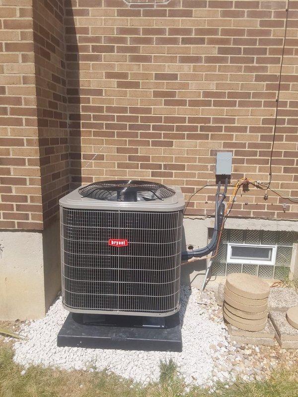 Completed full HVAC system replacement including installation of 235SAN03600A Legacy 3.0 ton heat pump with R454B refrigerant and FT5ANXC36L00 fan coil unit in basement. Installed TU-EC-15BKB 15kW heat kit for auxiliary heating. Replaced existing pole-mounted outdoor unit with new pad and pump-up installation due to width incompatibility (existing poles 37 inches apart, new unit 31 inches wide). Installed new electrical whip, disconnect box with fuses, and refrigerant line set connecting outdoor condenser to indoor air handler. Removed and properly disposed of old heat pump system. All electrical connections completed to code, system charged, tested, and verified operational.