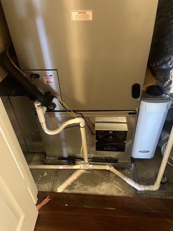 Completed estimate for heat pump replacement at residential property. Assessed existing rooftop HVAC equipment showing weathered cabinet enclosures, aged condenser units, and deteriorated support structures with rust formation on metal frames and electrical components. Evaluated indoor air handler system located in mechanical closet with existing PVC condensate drainage piping and flex ductwork connections. Provided comprehensive replacement options for complete heat pump system including outdoor condensing unit, indoor air handler, refrigerant line sets, condensate drainage modifications, electrical disconnect upgrades, and associated ductwork connections to restore efficient heating and cooling operation.