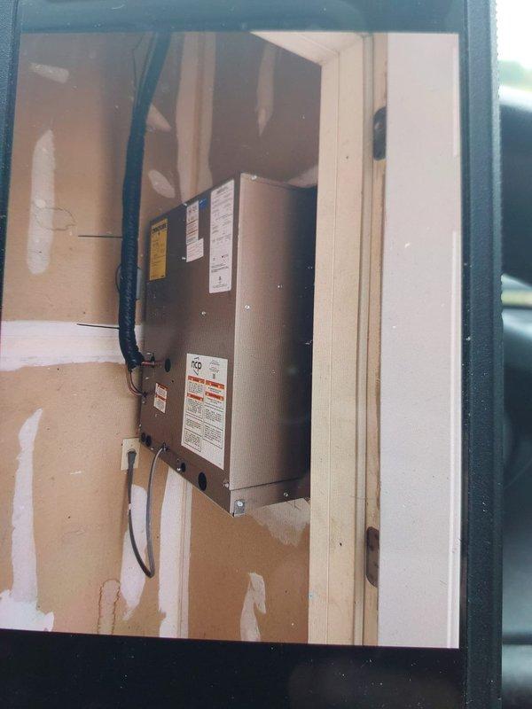 Successfully completed full commercial HVAC system installation including NCP5183000A condensing unit, FMA5X2400AL air handler, and 8 KW heat pack. Removed and disposed of existing equipment per EPA regulations, installed new system components with proper electrical connections verified at 33 amps, and secured all necessary permits. System was mounted, wired, tested, and left operational with all safety labels properly affixed.