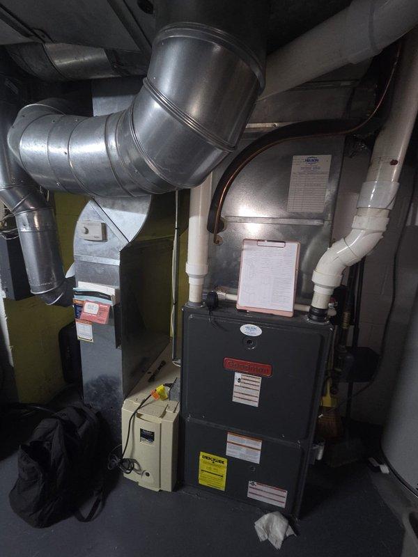 Completed comprehensive HVAC system replacement estimate for residential property. Documented existing equipment including furnace unit in basement mechanical room with connected ductwork and outdoor condensing unit positioned on concrete pad against exterior wall. Assessed current system configuration, equipment condition, and installation requirements for full system replacement recommendation.