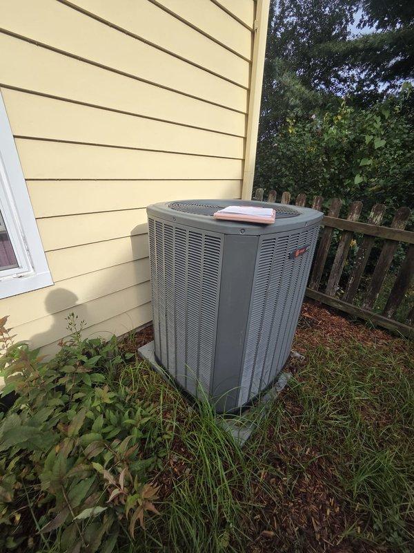 Completed comprehensive HVAC system replacement estimate for residential property. Documented existing equipment including furnace unit in basement mechanical room with connected ductwork and outdoor condensing unit positioned on concrete pad against exterior wall. Assessed current system configuration, equipment condition, and installation requirements for full system replacement recommendation.