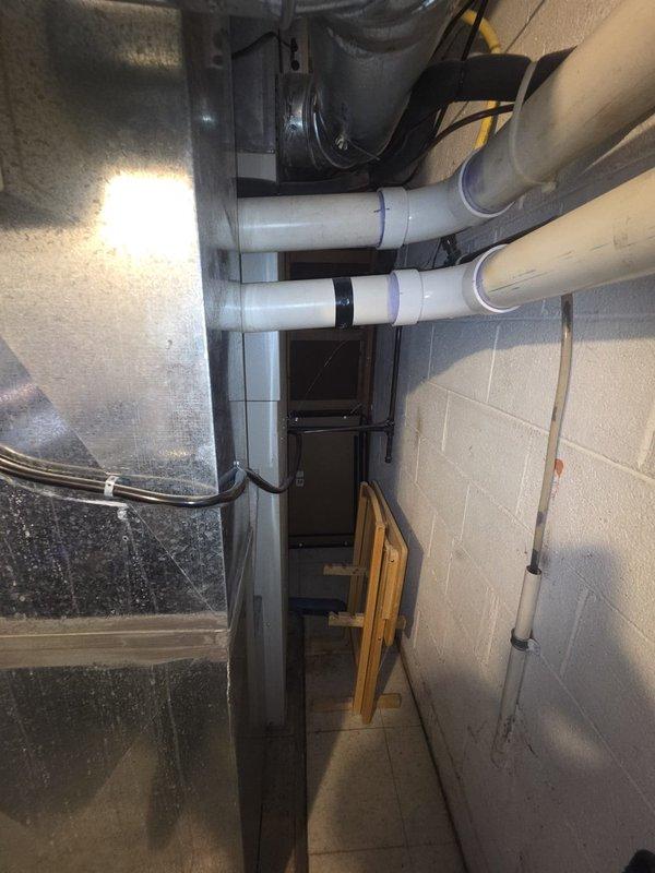 Conducted comprehensive assessment of existing HVAC system in basement for complete replacement estimate. Evaluated current Nordyne 92,000 BTU furnace with 3-ton air conditioning system, documenting equipment specifications including PVC flue configuration at 3" diameter and single-phase electrical requirements. Performed detailed ductwork measurements and airflow calculations, determining 7,590 CFM requirements with return dimensions of 22x18 and supply configurations of 8x20, 7x20, and 16x20. Identified need for minimum 20-foot line set for new installation and recommended replacement of existing filtration system with 4-inch media air cleaner. Documented electrical specifications including 3/4-inch refrigerant line requirements and thermostat replacement needs for upgraded system compatibility.