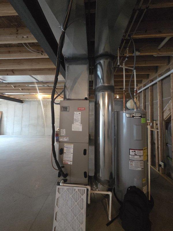 Conducted comprehensive assessment of existing Bryant HVAC system in basement location for complete system replacement. Documented current equipment specifications, measured and diagrammed ductwork layout including supply and return configurations, calculated airflow requirements at 745 CFM based on square footage measurements, and photographed existing furnace and water heater installations to develop accurate replacement estimate for upflow furnace system with proper sizing specifications.