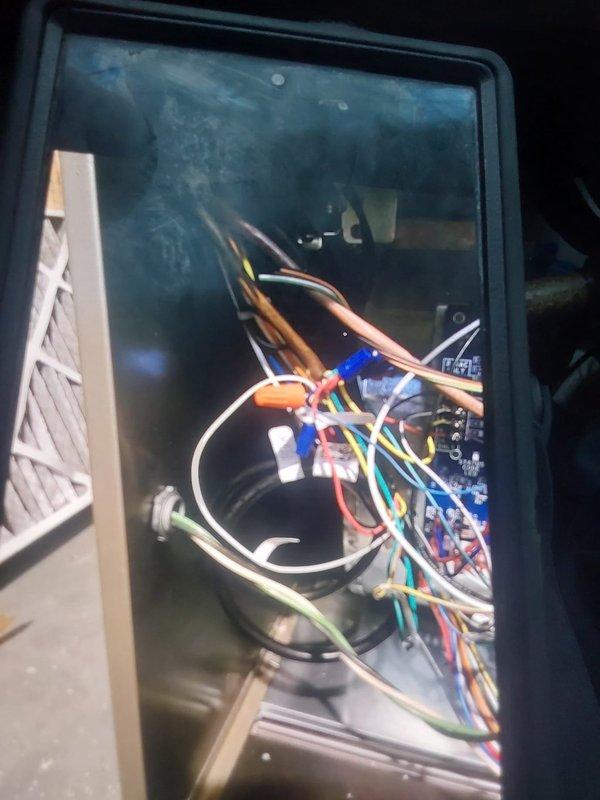 Responded to installation callback to address inspection violation regarding accessory wiring for furnace. Corrected MC connector installation at 90-degree bend to comply with manufacturer specifications per NEC 110.3B. Verified all electrical connections within control panel are secure and properly terminated with appropriate wire nuts and connectors.