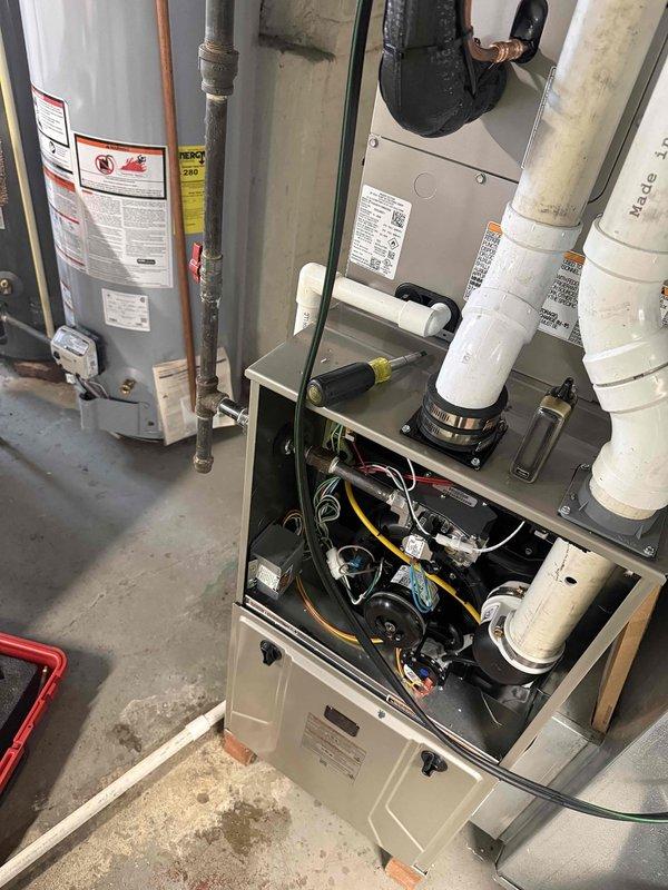 Completed full HVAC system replacement including removal and EPA-compliant disposal of existing equipment. Installed Bryant GA4SAN52400 2-ton air conditioning condenser unit on new pad with electrical disconnect, whip, and fuses, along with CVAVA2417 evaporator coil and Bryant 912SB48080 80,000 BTU 90% efficiency gas furnace. Flushed and connected lineset, fabricated and installed sheet metal ductwork connections to existing flue system, completed all electrical connections, obtained permit, and verified system operation upon startup.