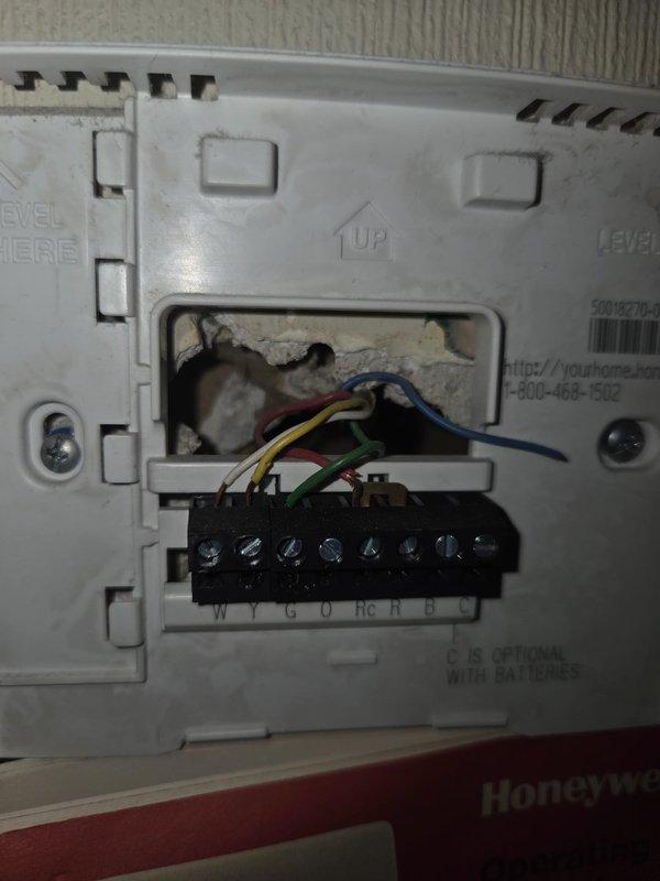 Performed comprehensive estimate for complete HVAC system replacement on 25+ year-old air conditioning and furnace unit. Homeowner gathering multiple quotes to plan for future replacement and coordinating with home warranty coverage. Documented existing Honeywell thermostat wiring configuration and photographed current furnace installation in basement location for accurate equipment sizing and replacement specifications.