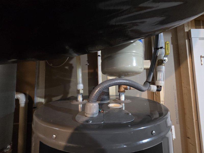 Conducted site evaluation for whole house dehumidifier and humidifier installation on existing Tempstar furnace system. Assessed mechanical room layout, existing HVAC equipment configuration, available space for IAQ equipment integration, and electrical requirements. Documented current system setup including ductwork connections and utility locations to prepare comprehensive estimate for indoor air quality equipment addition.
