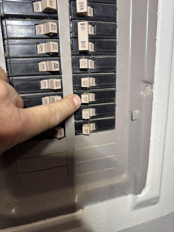 Performed leak check on residential air conditioning system using refrigerant recovery and diagnostic equipment. Connected manifold gauges to outdoor condensing unit and conducted pressure testing to identify potential refrigerant leaks in the system. Verified electrical disconnect operation at breaker panel during diagnostic procedure.