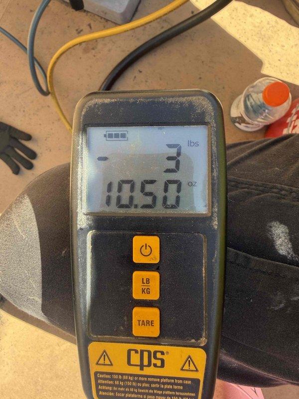 Returned to site to complete compressor replacement on commercial HVAC unit. Removed failed compressor and installed new ZP21LXE-PFV-800 scroll compressor with serial number 26H89C16M. Secured unit to mounting base with proper brackets and hardware. Evacuated system, charged with 10.50 ounces of refrigerant per manufacturer specifications, and verified proper operation of all components.
