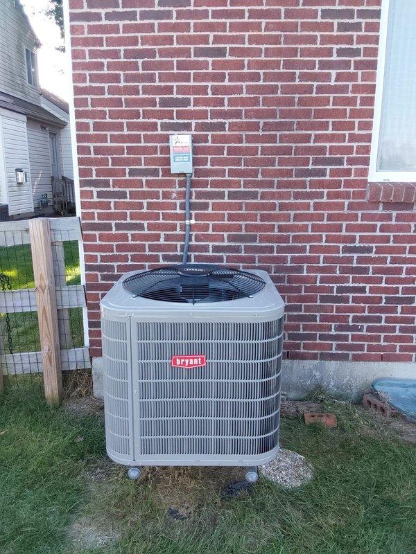 Completed full HVAC system replacement including installation of Bryant 927TA60100V21 gas furnace, Bryant 146SAN04801W 4-ton single-stage air conditioner utilizing R454B refrigerant, and CVAVA4821XMA cased vertical evaporator coil. Performed lineset nitrogen purge, RX11 flush, and pressure leak test to ensure system integrity. Installed new exterior disconnect box with fuses, replaced filter rack with new filter, and upgraded to Honeywell T6 thermostat. Reconnected all components to existing gas line, flue pipes, ductwork, and exterior electrical poles. System tested and operational.