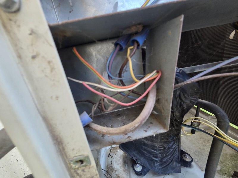 Performed a replacement estimate for the existing air conditioner and gas furnace system. Inspected the outdoor condensing unit, where the control compartment showed heavy dust, cobwebs, and aged wiring and insulation consistent with long-term weathering, and evaluated the Bryant Evolution Plus 90i gas furnace, which showed no visible frost, rust, or major damage. Documented equipment conditions with photos and reviewed replacement options with the customer.