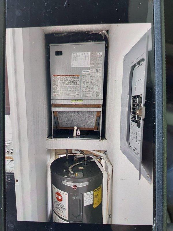 Installed a new 1.5-ton, 14 SEER condensing unit on a new pad, paired with a Bryant FMA5X18 air handler with 8 kW electric heat in the closet. Connected the existing supply and return with new sheet metal, flushed the lineset, and installed a disconnect and fuses. Recovered and disposed of the existing equipment per EPA specifications.