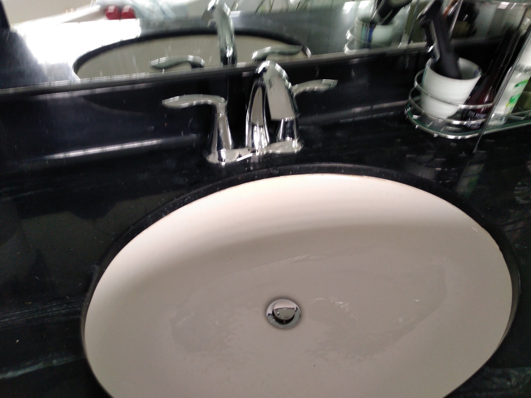 Supply and Install two Moen Eva faucets 