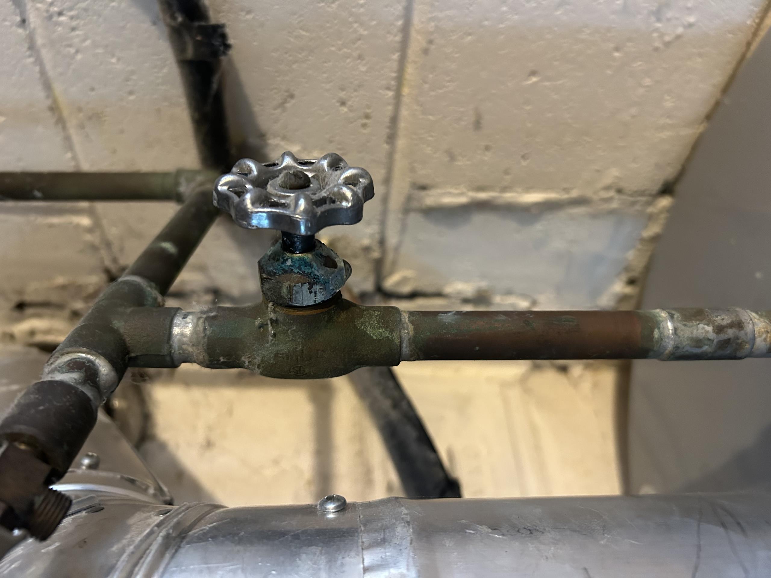 Replaced leaking valve at hot water tank 
