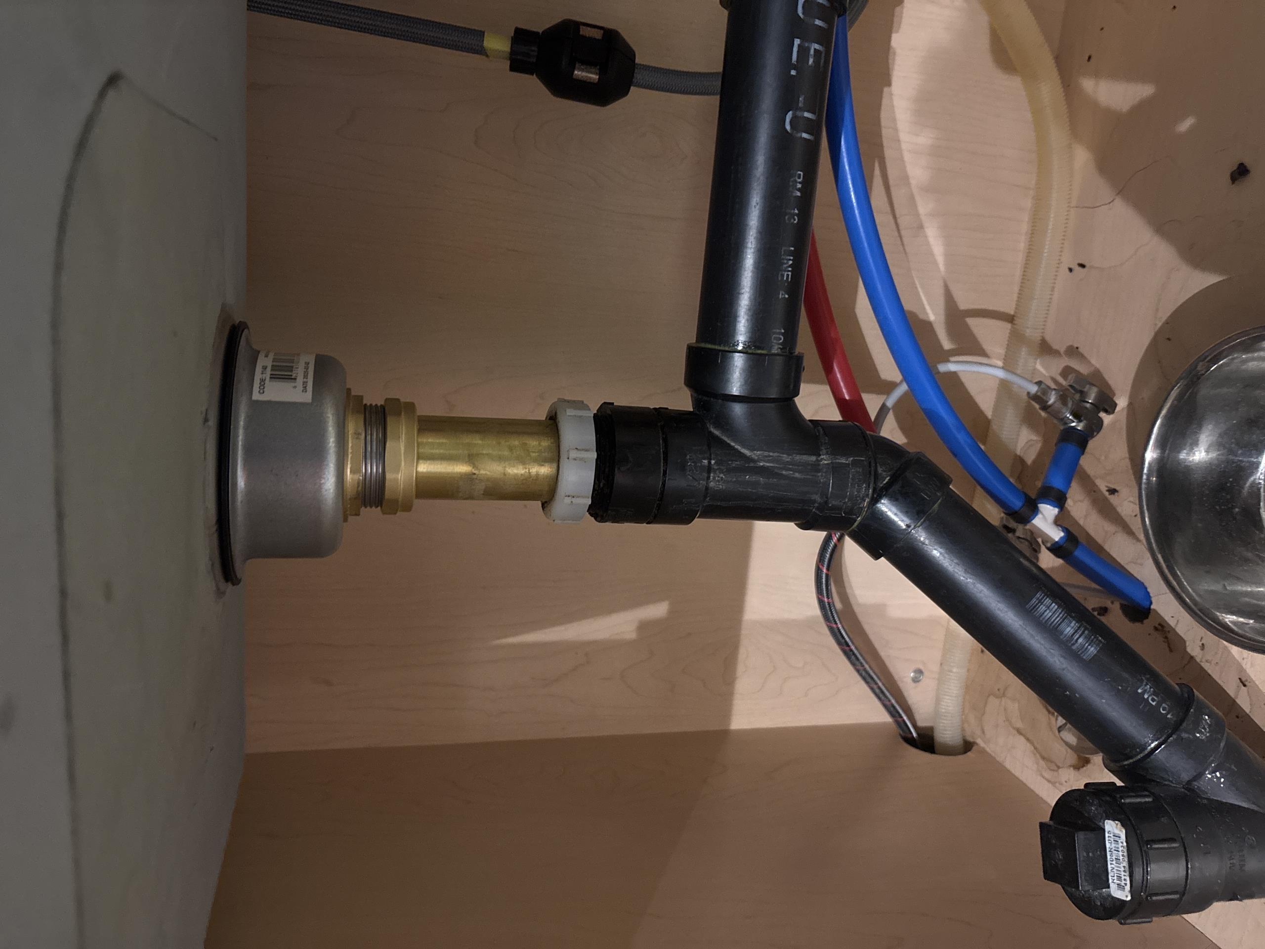 replace basket strainers under kitchen sink