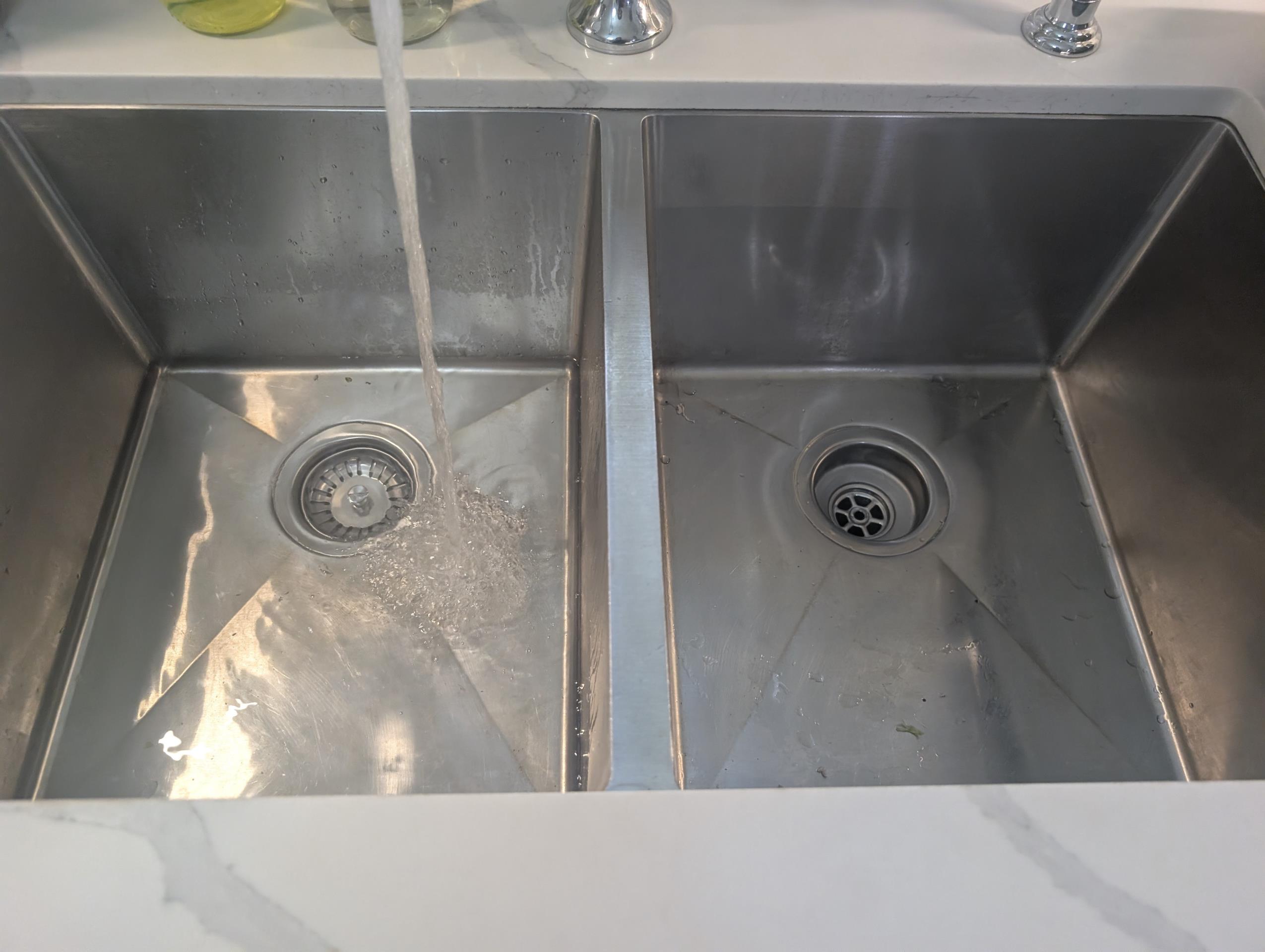 leak under kitchen sink when tap is used