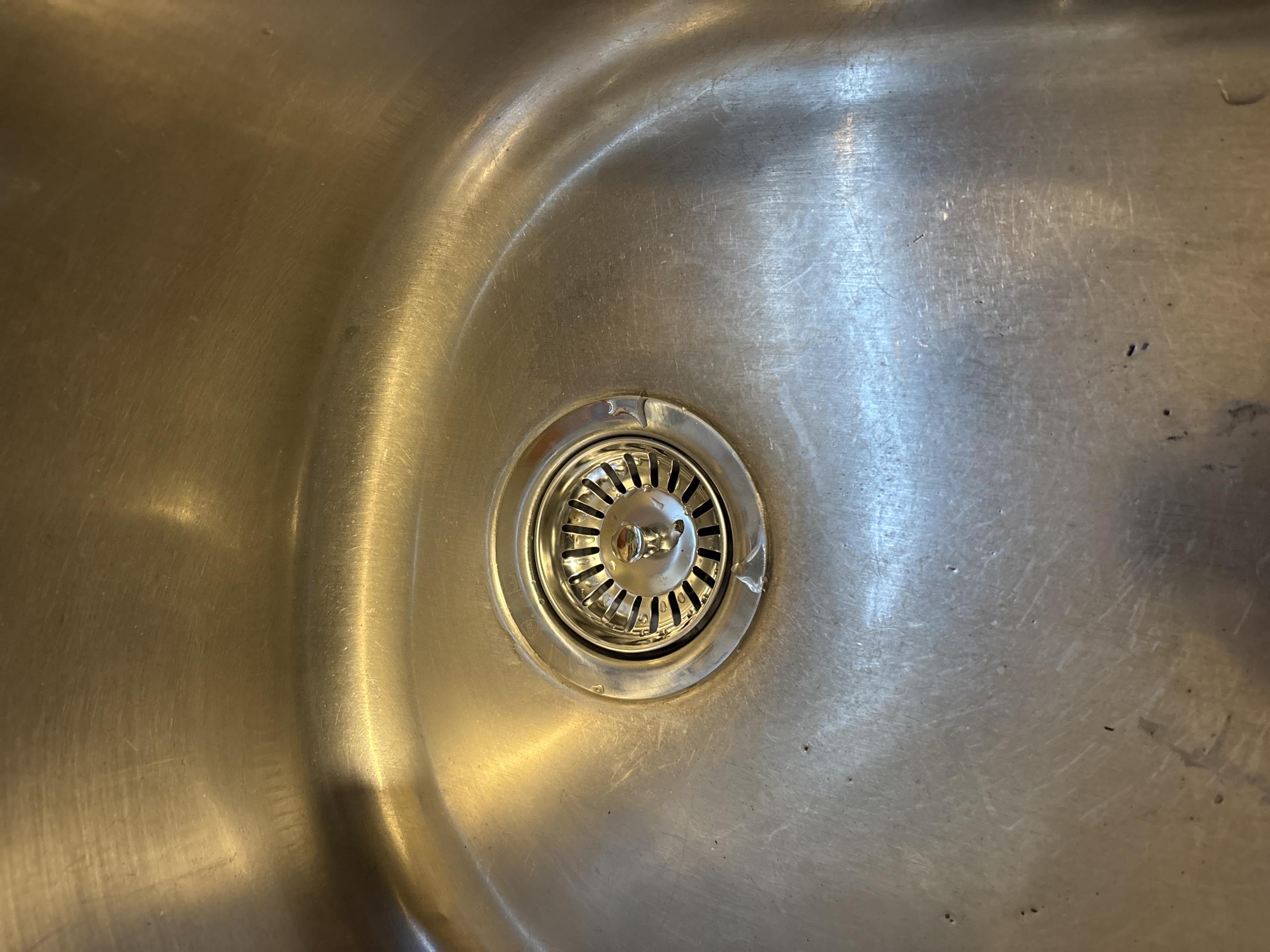 replace basket strainers in kitchen sink